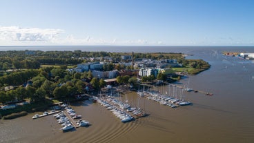 Scenic summer view of the Old Town and sea port harbor in Tallinn, Estonia.