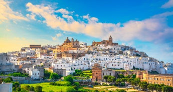 Photo of aerial morning view of Amalfi cityscape on coast line of Mediterranean sea, Italy.