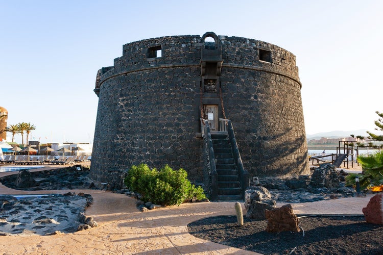 Photo of Tower of Caleta de Fuste at sunset, Spain.