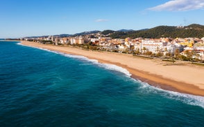 Photo of panoramic aerial view of beautiful Blanes in Costa Brava on a beautiful summer day, Spain.