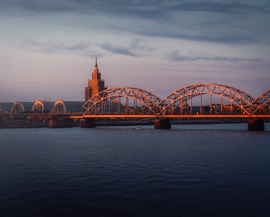 Railway Bridge and Latvian Academy of Sciences at sunset - Riga, Latvia