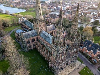 Photo of aerial view of ancient Medieval Cathedral in Lichfield, United Kingdom.