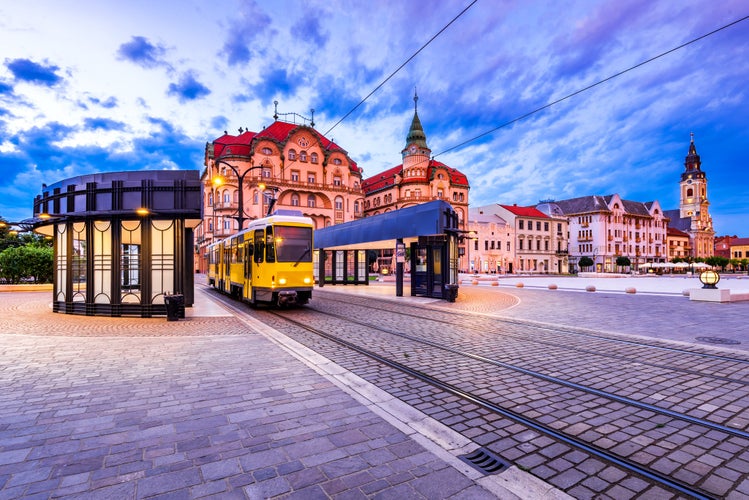 Oradea, Transylvania with tram station in Union Square cityscape in Romania.