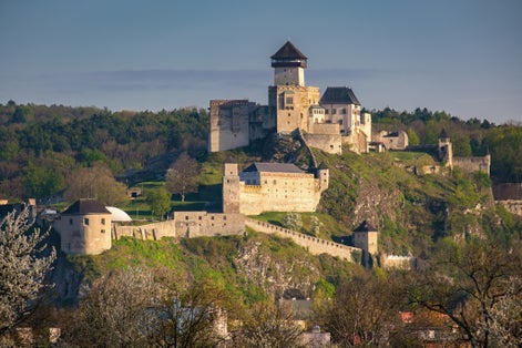 Trenčín (Trencin) Castle is a castle above the town of Trencin in western Slovakia. Spring nature, flowering trees, medieval castle