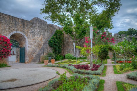 Photo of Tavira castle with a garden inside, Portugal.