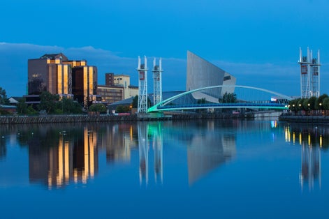 photo of view of The Lowry footbridge and Imperial War Museum North, Salford Quays, Salford, Manchester, England, United Kingdom, Europe