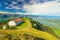 photo of along trail around Rigi Kulm, the highest peak on Mount Rigi over 13 lakes and peaks of Swiss Alps. Canton of Lucerne, Central Switzerland. Green meadows, outdoor activities in summer.