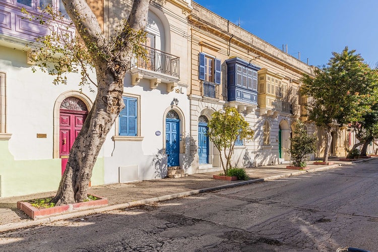 Colorful houses in the city of Attard, Malta .