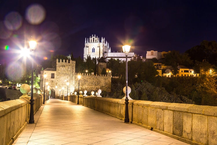 photo off view of Bridge San Martin in Toledo, Spain in a beautiful summer night