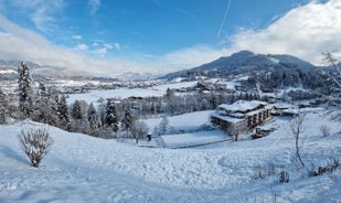 photo of beautiful alpine summer view with a church at Waidring, Tyrol, Austria.