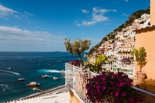 Photo of aerial morning view of Amalfi cityscape on coast line of Mediterranean sea, Italy.