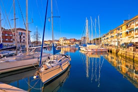 Photo of Pier and sea in town of Grado sunrise view, Italy.