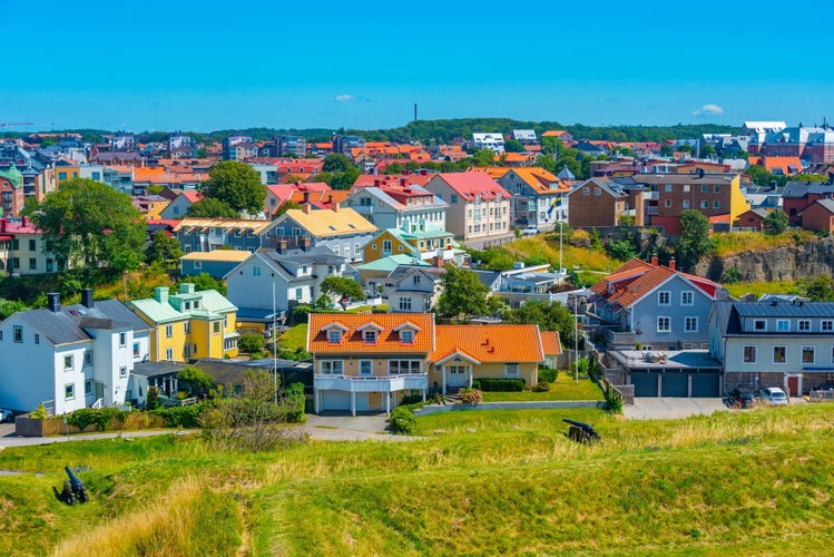 photo of Colorful timber houses in Swedish town Varberg.