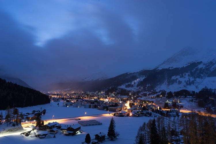 photo of amazing Davos at night in winter in Switzerland.