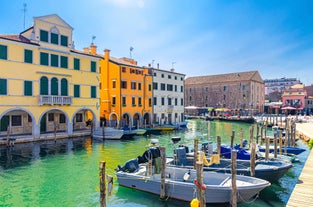 Photo of Aerial view of the white tall apartment buildings of the coast of Chioggia in Italy.