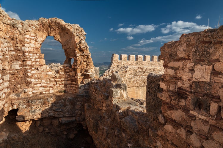 Photo of Well-preserved ruins of the ancient Greek fortress Larisa with stone walls and towers, Argos, Greece.