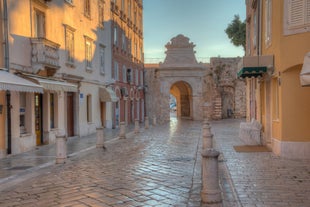 Photo of aerial view of town of Labin with old traditional houses and castle in Istria, Croatia.