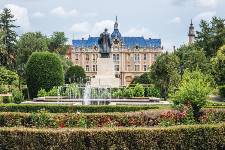 photo of view of Vasile Lucaciu monument and historical Hotel Dacia in Satu Mare city, Romania