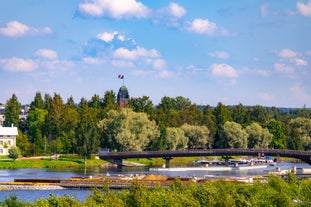 Photo of aerial view of beautiful landscape of lakes and forest in Imatra, Finland.