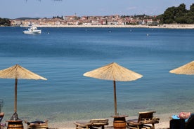 Photo of aerial view of town of Umag historic coastline architecture , archipelago of Istria region, Croatia.