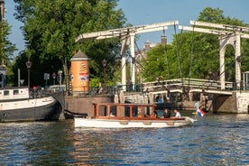 Private Bootstour Amsterdam - 90 Min inkl. Begrüßungsgetränk auf einem historischen Salonboot