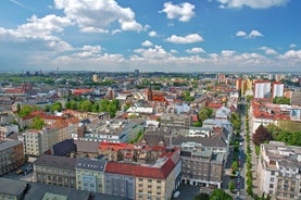 Photo of Lednice Chateau with beautiful gardens and parks on a sunny summer day, Czech Republic.