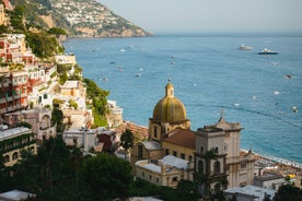 Photo of aerial morning view of Amalfi cityscape on coast line of Mediterranean sea, Italy.