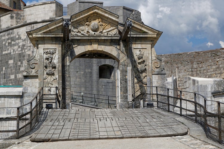 photo of view of Drawbridge in Fort de Joux. The castle commands the mountain pass Cluse de Pontarlier and was improved by famous architect Vauban.