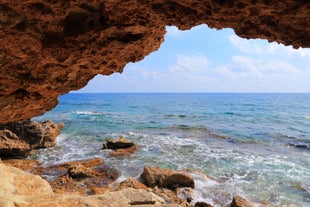 Photo of aerial view on clear blue water of Coral bay in Peyia, Cyprus.