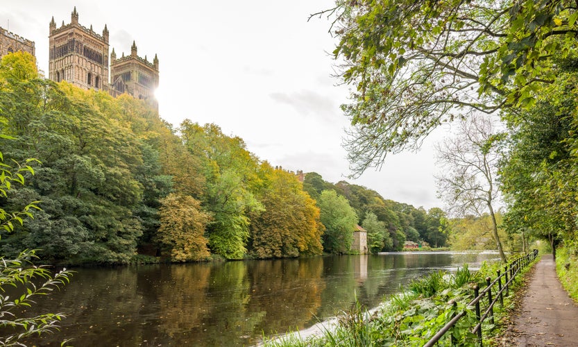 photo of view of Durham Cathedral viewed from the riverside walk on the River Wear, Durham, England, UK.