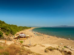 photo of sea landscape with Calella de Palafrugell, Catalonia, Spain near of Barcelona. Scenic fisherman village with nice sand beach and clear blue water in nice bay. Famous tourist destination in Costa Brava.