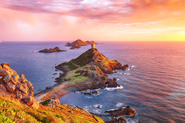 Photo of sunset over popular tourist destination Torra di a Parata with Genoese Tower, Ajaccio commune.