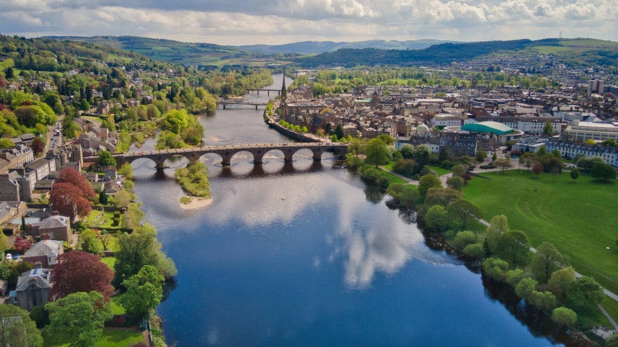 photo of view of The meandering current of the River Tay. Perth, Scotland - May 16, 2021 Picturesque landscape of the River Tay and the city of Perth, Scotland.