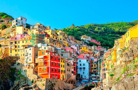 photo of view of Riomaggiore is a village in the province of La Spezia, Liguria, Cinque Terre Coast of Italy. Riomaggiore one of five famous colorful villages of Cinque Terre National Park in Italy. Landmark of Italy,Riomaggiore italy.
