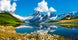 photo of sunrise view on Bernese range above Bachalpsee lake. Peaks Eiger, Jungfrau, Faulhorn in famous location in Switzerland alps, Grindelwald valley.