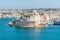 Photo of aerial view of Fort Saint Angelo of Birgu in Malta from the sea.