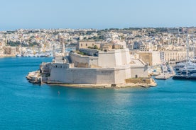 Aerial view of Lady of Mount Carmel church, St.Paul's Cathedral in Valletta embankment city center, Malta.