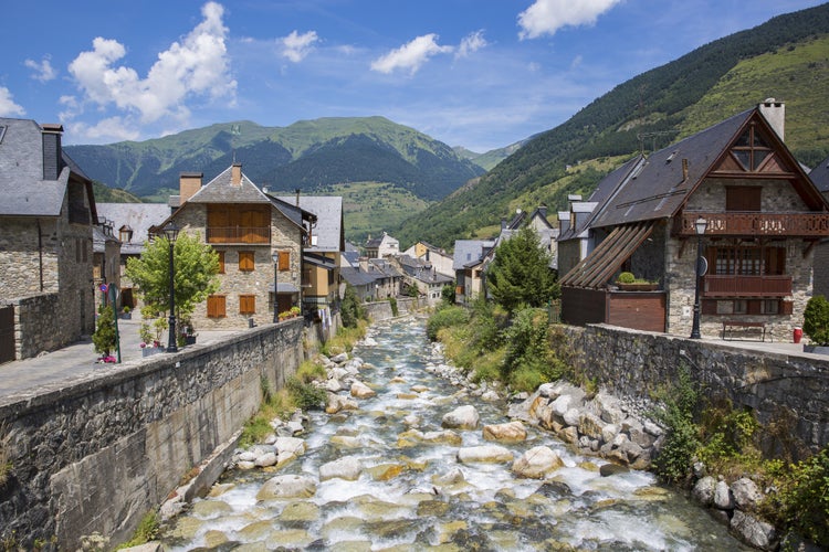 Photo of Arriu Nere (Black river) at his pass for Vielha in a spring day. Aran Valley, Lleida, Catalonia, Spain