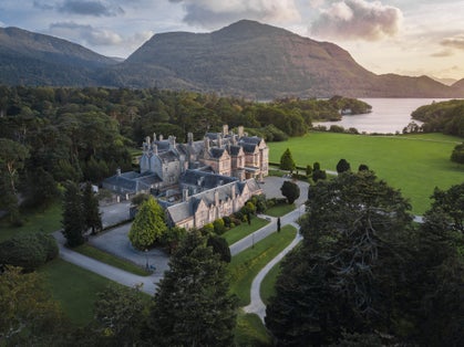 Photo of aerial view of Muckross House and gardens in National Park Killarney, Ireland.