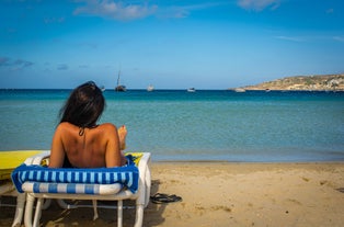 Photo of attractive view of Golden bay in village Manikata on a sunny day, north-west coast of Malta island.