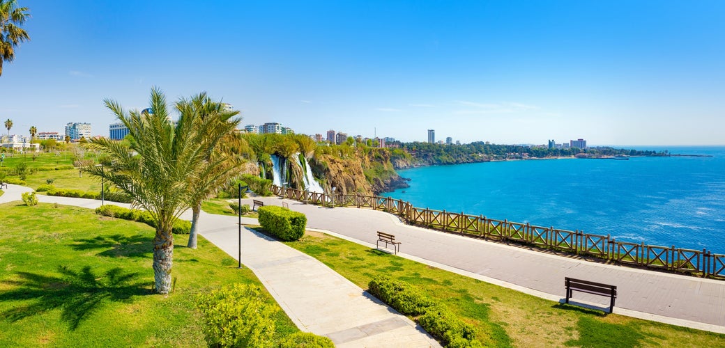 Photo of Panoramic aerial view of water cascading from platform into Mediterranean sea in Antalya.