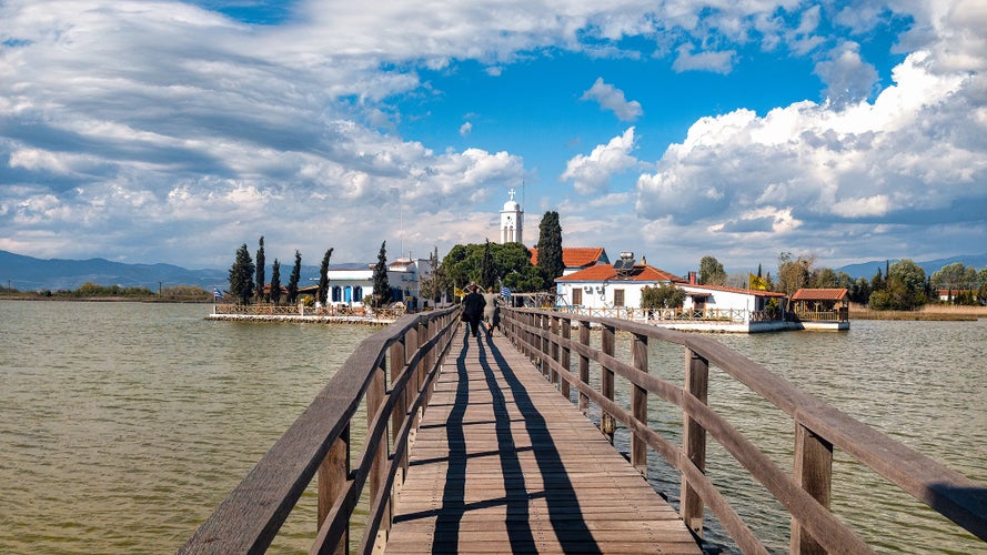 photo of the Monastery of Agios Nikolaos in Vistonida Lake. The aquatic biotope of lake, hosts more than 200 species of wild birds spend the wintertime in this area. Xanthi Prefecture. Greece.