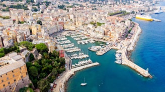 Photo of colorful houses on the shore of Bastia port, bright morning view of Corsica island, France.