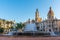 photo of Plaça de l'Ajuntament is a town hall behind a fountain in Spanish town Valencia, Spain.