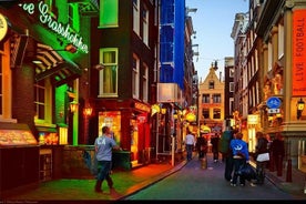 Tour a piedi privato del quartiere a luci rosse e tour gastronomico di Amsterdam