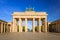 photo of view of The Brandenburg Gate in Berlin at sunrise, Germany