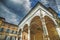 photo of view of Loggia del Papa under a grey sky with clouds in Siena, Italyx,Siena italy.