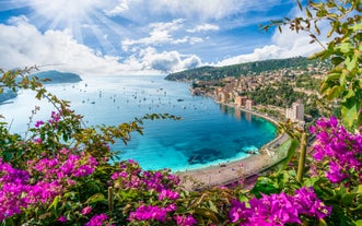 Photo of aerial cityscape view on French riviera with yachts in Cannes city, France.