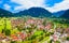 Photo of aerial panoramic view of Oberammergau town in the district of Garmisch-Partenkirchen in Bavaria, Germany.