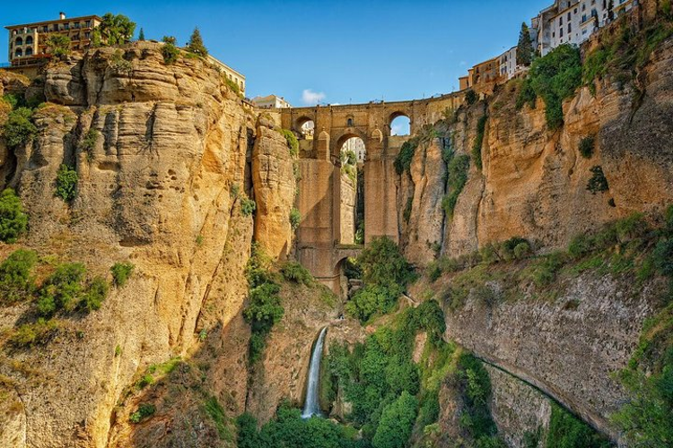 A stunning photograph showcasing the majestic Puente Nuevo bridge in Ronda..png